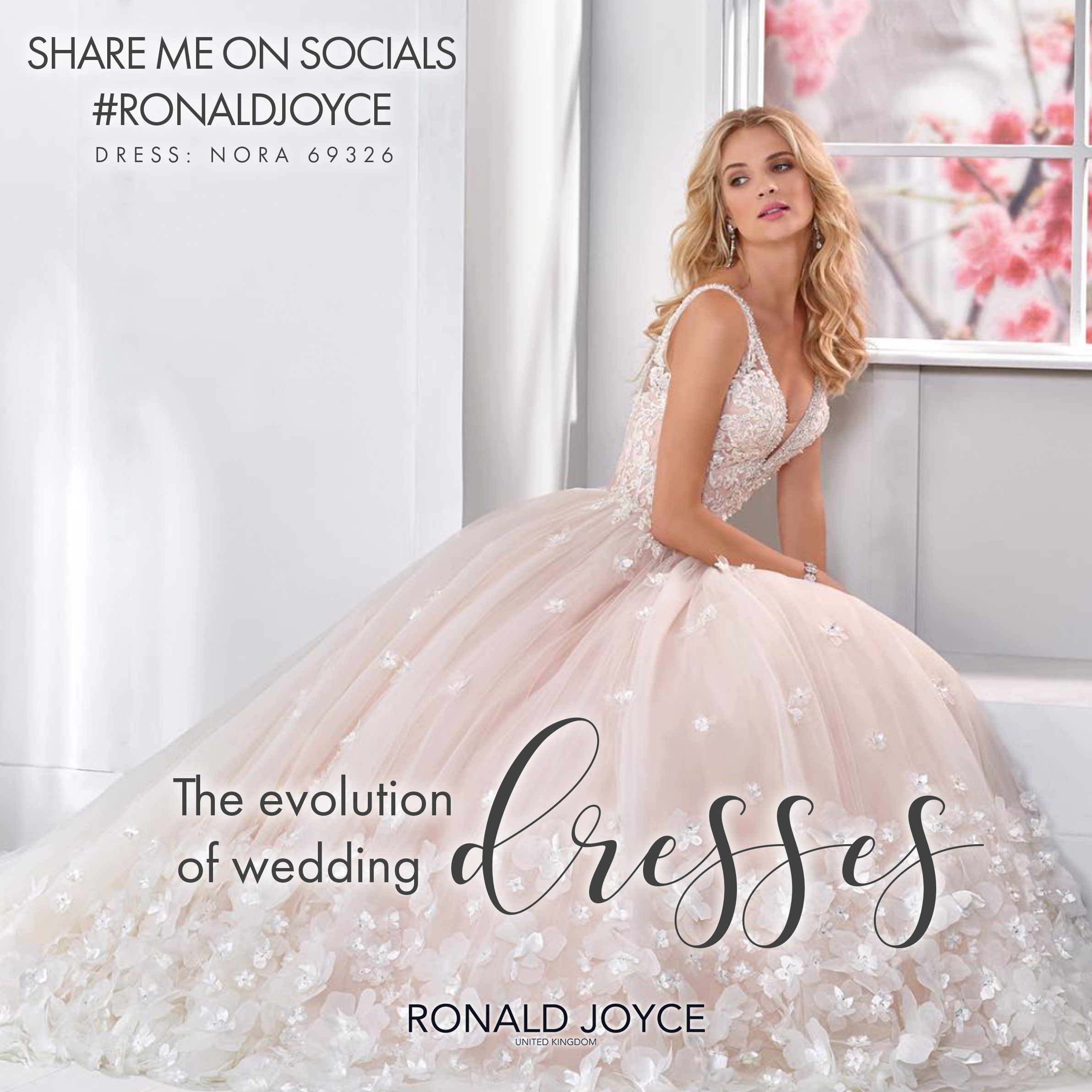 Image of a model sat in an all-grey room by a window in a blush ballgown wedding dress and the title ‘The evolution of wedding dresses.' Model looks away from window. 